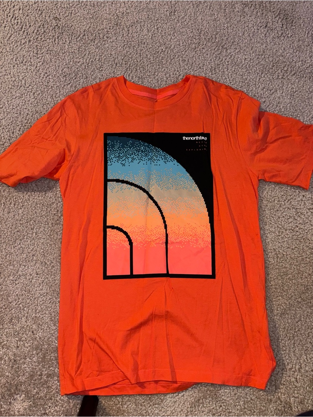 The North Face Orange Short-Sleeve Tee with Sunset Graphic